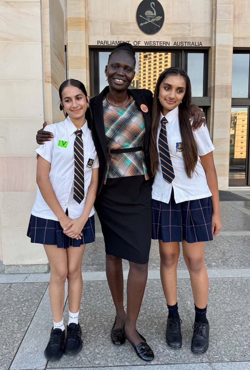 Picture with Hon. Ayor Makur Chuot outside WA Parliament!